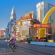 Lonely cyclist on deserted, empty Las Vegas Strip during the COVID-19 pandemic / coronavirus pandemic, Clark County, Nevada, United States, USA